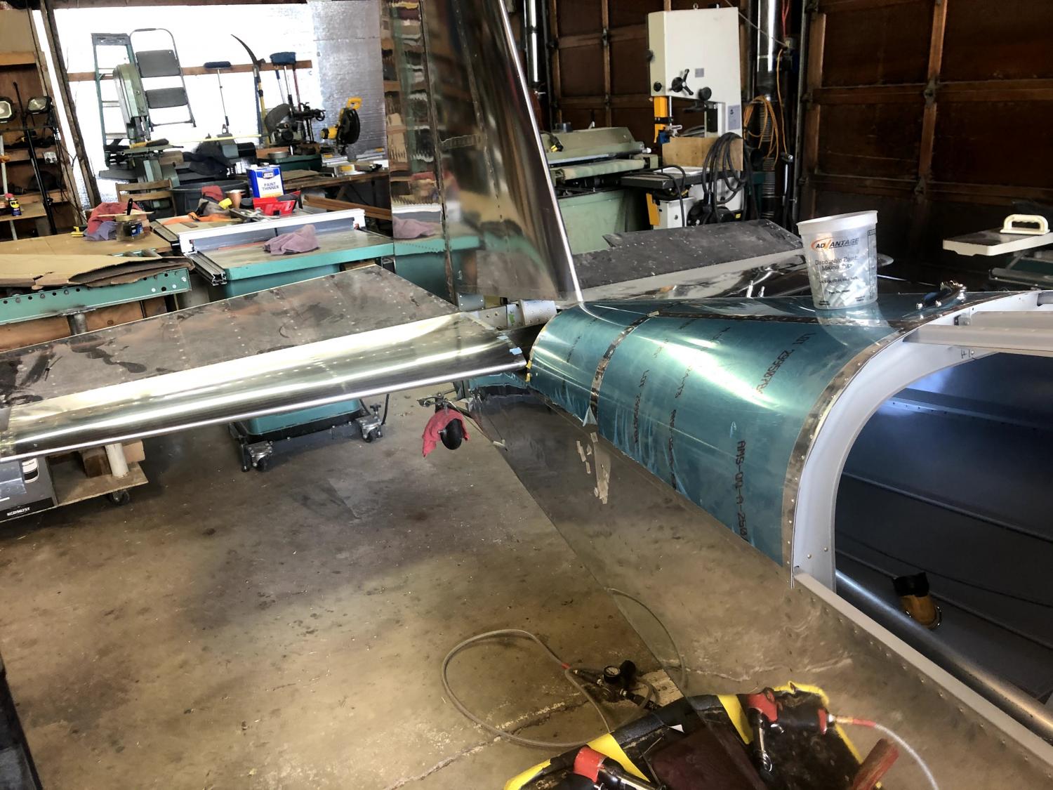 Aft top skins riveting